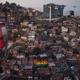 The new cable car system travels over the Complexo do Alemão favela in Rio. AP Photo/Leo Correa